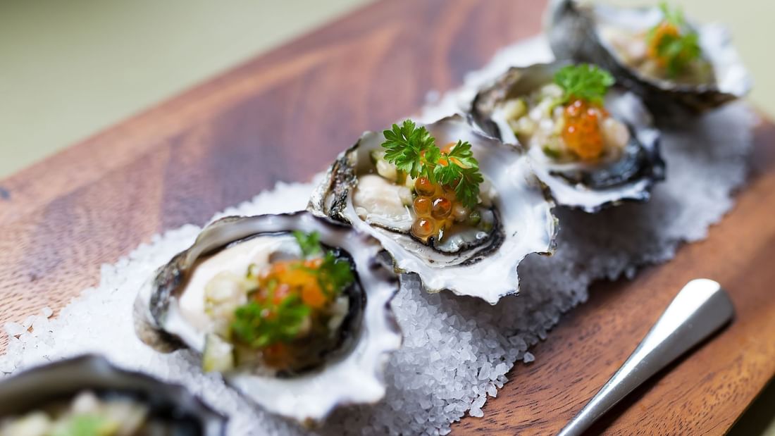 Close-up of fresh oysters served in Elara Boardroom at Pullman Sydney Olympic Park