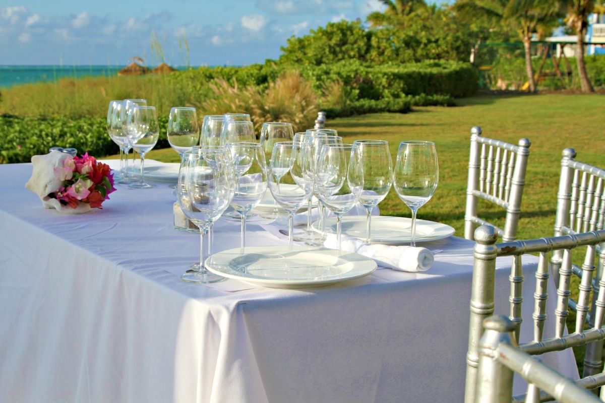 Table set-up for an event outdoors at The Somerset on Grace Bay