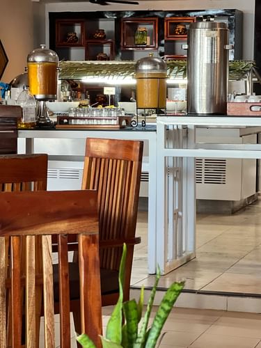 Chairs and counter with food and drinks at Bula Brasserie, Warwick Fiji Resort and Spa, Korolevu