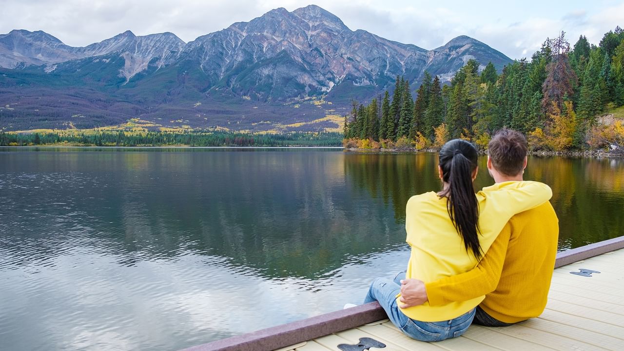 Couple sitting by the Pyramid Lake.
