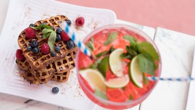Waffles and a drink served at Clevelander South Beach