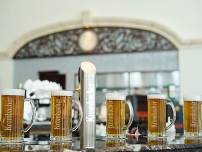 Close-up of beer glasses on the counter at Hanoi Daewoo Hotel