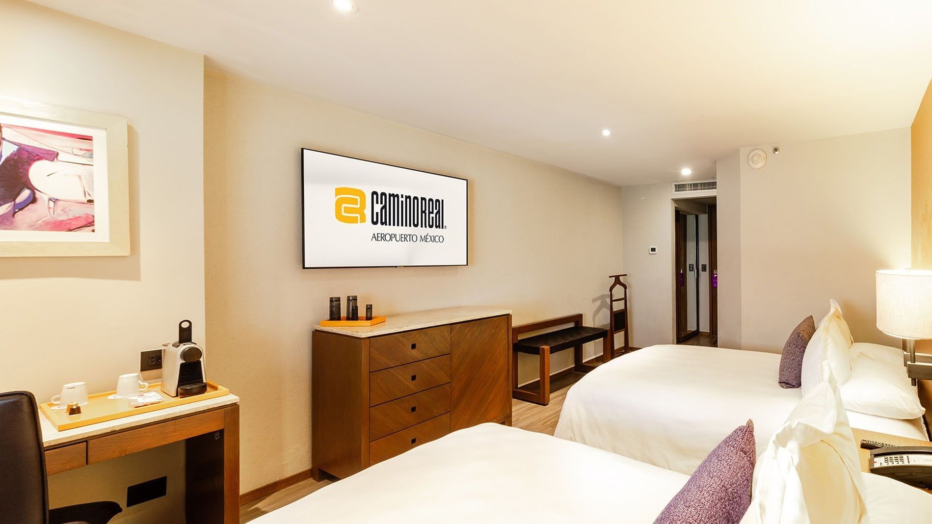 Habitación Camino Real Club con 2 camas dobles en el Camino Real Aeropuerto México en Ciudad de México