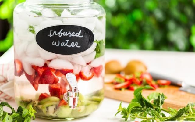 Infused water to keep wedding guests cool at a summer wedding