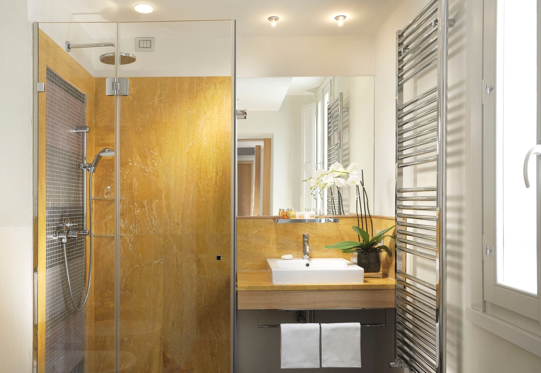 Shower area with wash basin and mirror in bathroom of Double Superior Room at Babuino 181