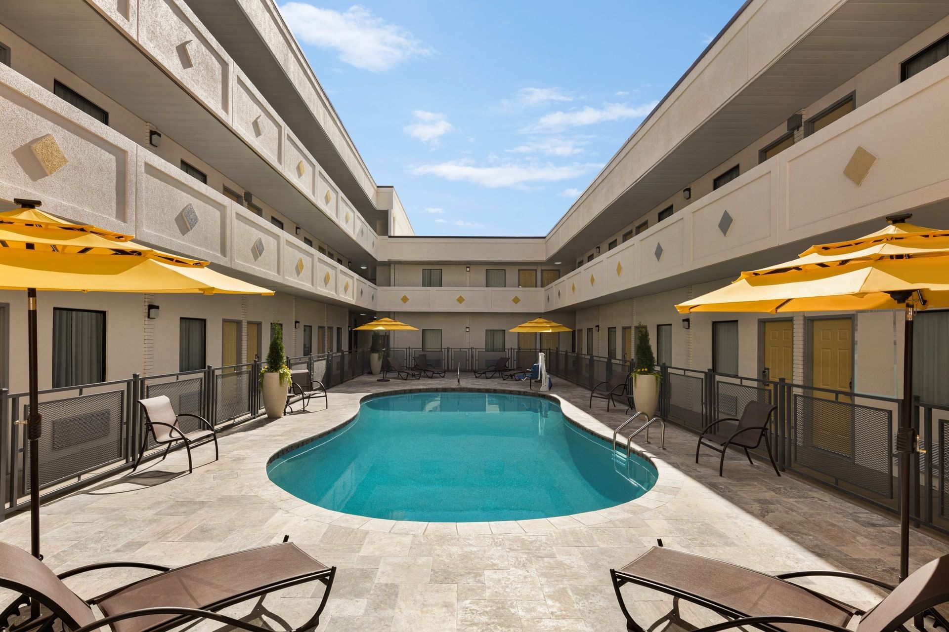 The outdoor pool and the lounge at Hotel Bo West Village