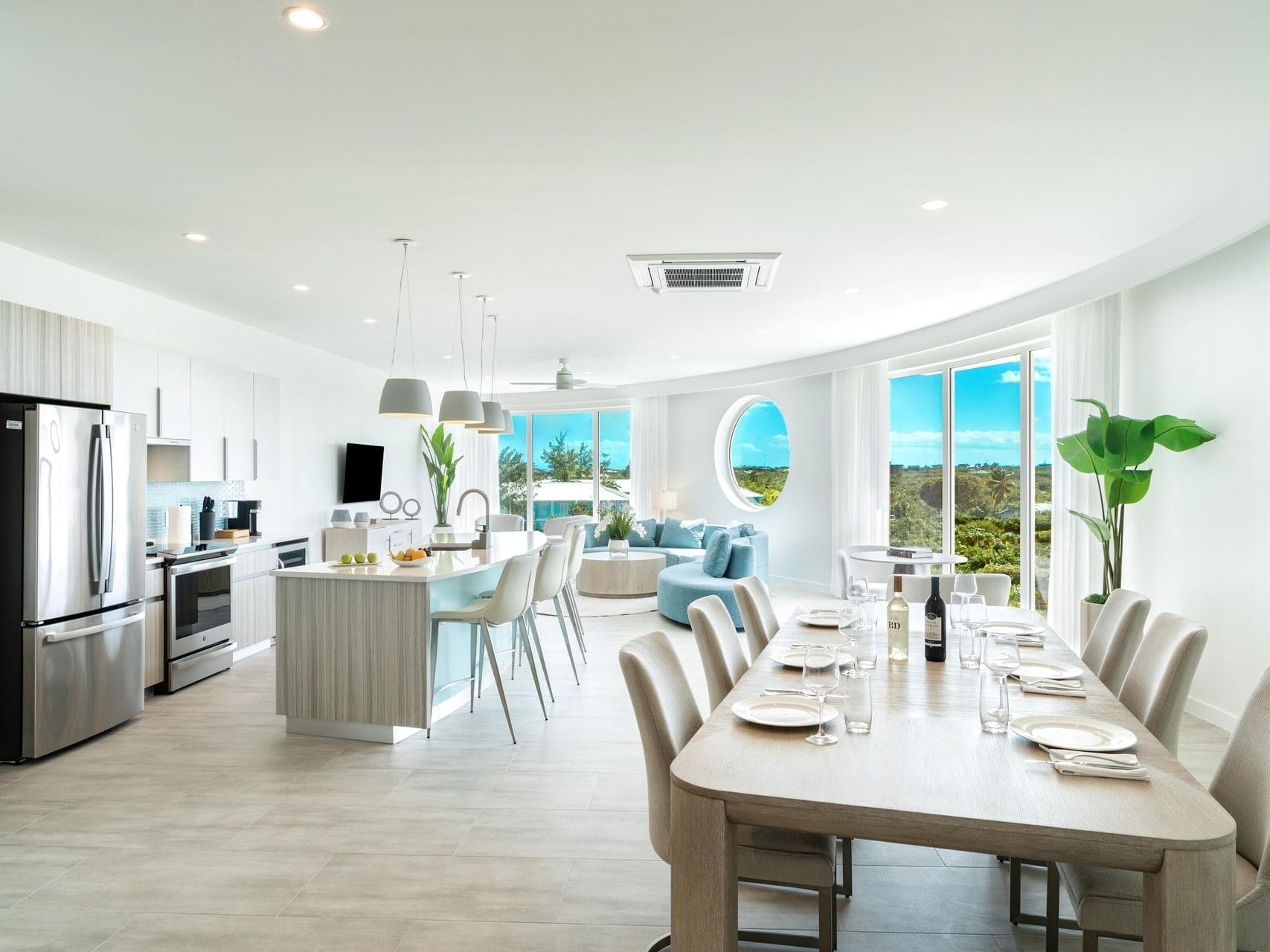 Modern dining area and kitchen in Ellipse Apartment Suite at Ellipse Resort, Grace Bay.