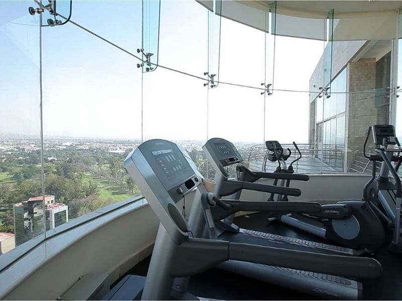 Treadmills & view in the Fitness Room at Grand Fiesta Americana