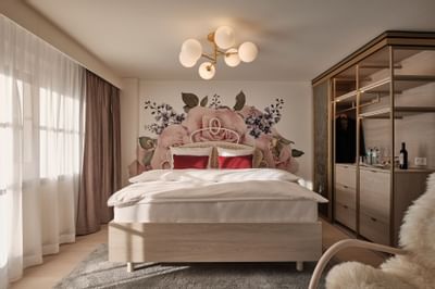 King bed in Premium Superior Double Room at Liebes Rot Flueh