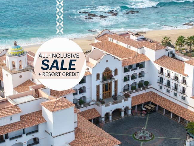 Vista aérea del hotel con playa y océano en el fondo, oferta de venta todo incluido y crédito del resort.