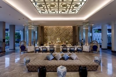 Reception of U SATHORN BANGKOK with seating area at U Hotels