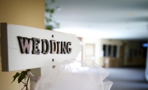 A decorative wedding sign displayed on a wood at Sunway Hotel Big Box