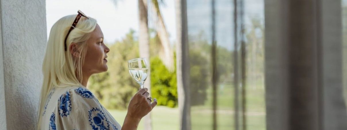 Woman overlooking sunset views | Mercure Gold Coast