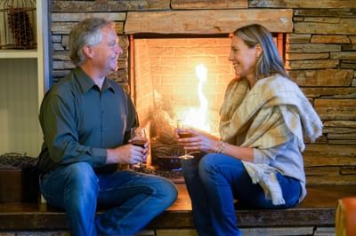 oregon garden resort fireplace lobby wine couple