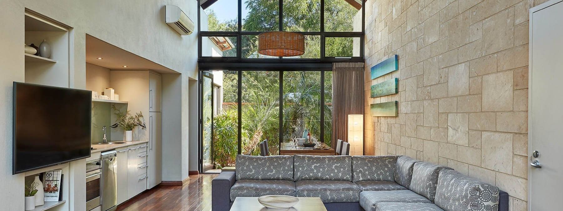 Living area of a Two Bedroom Villa at Pullman Bunker Bay Resort