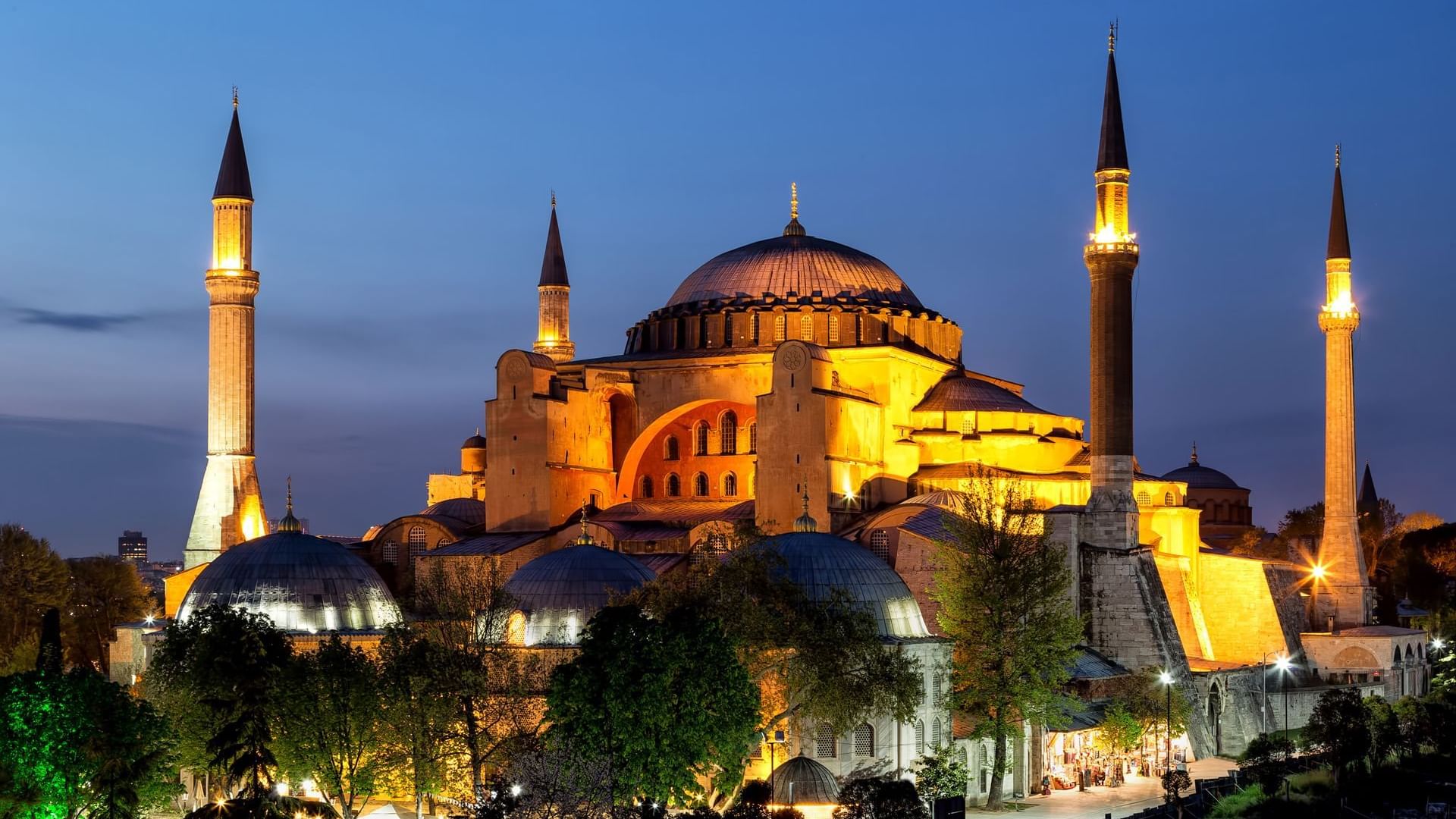 Distant view of the Hagia Sophia Grand Mosque at night near Titanic Business Kartal