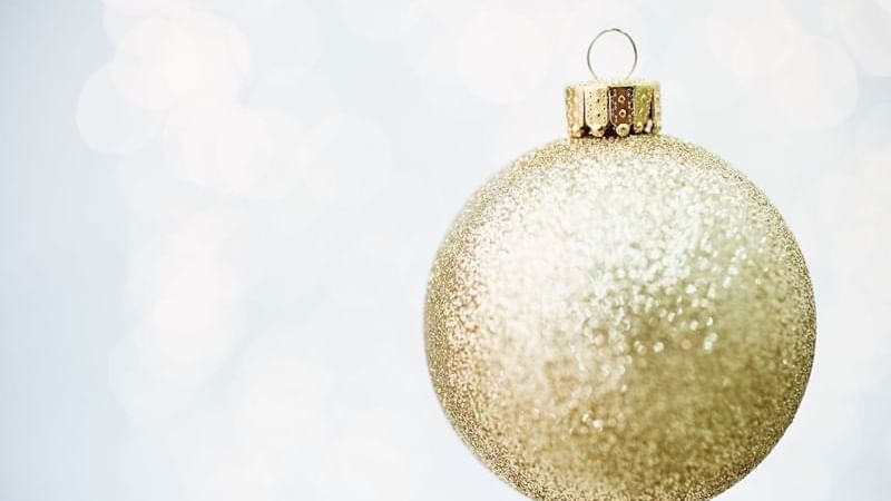 A golden Christmas ornament at The Londoner Hotel