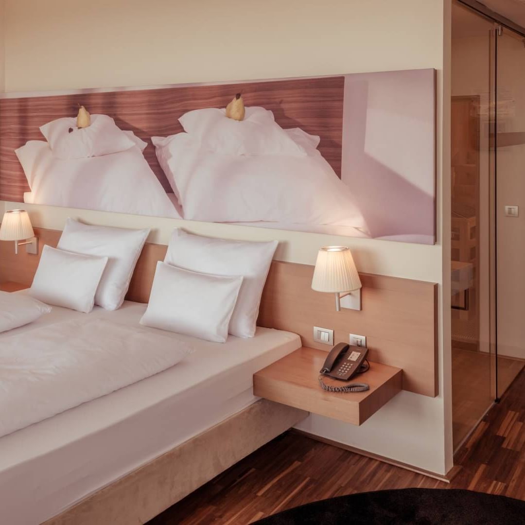 Comfy bed in Spa Suite with Sauna, Falkensteiner Balance Resort
