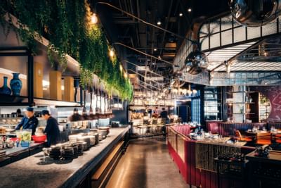 Interior of the Mott 32 with the bar at Paradox Hotel Vancouver