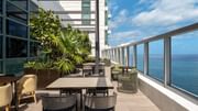 Terrace of 33rd floor lounge with panoramic views of the Atlantic Ocean.