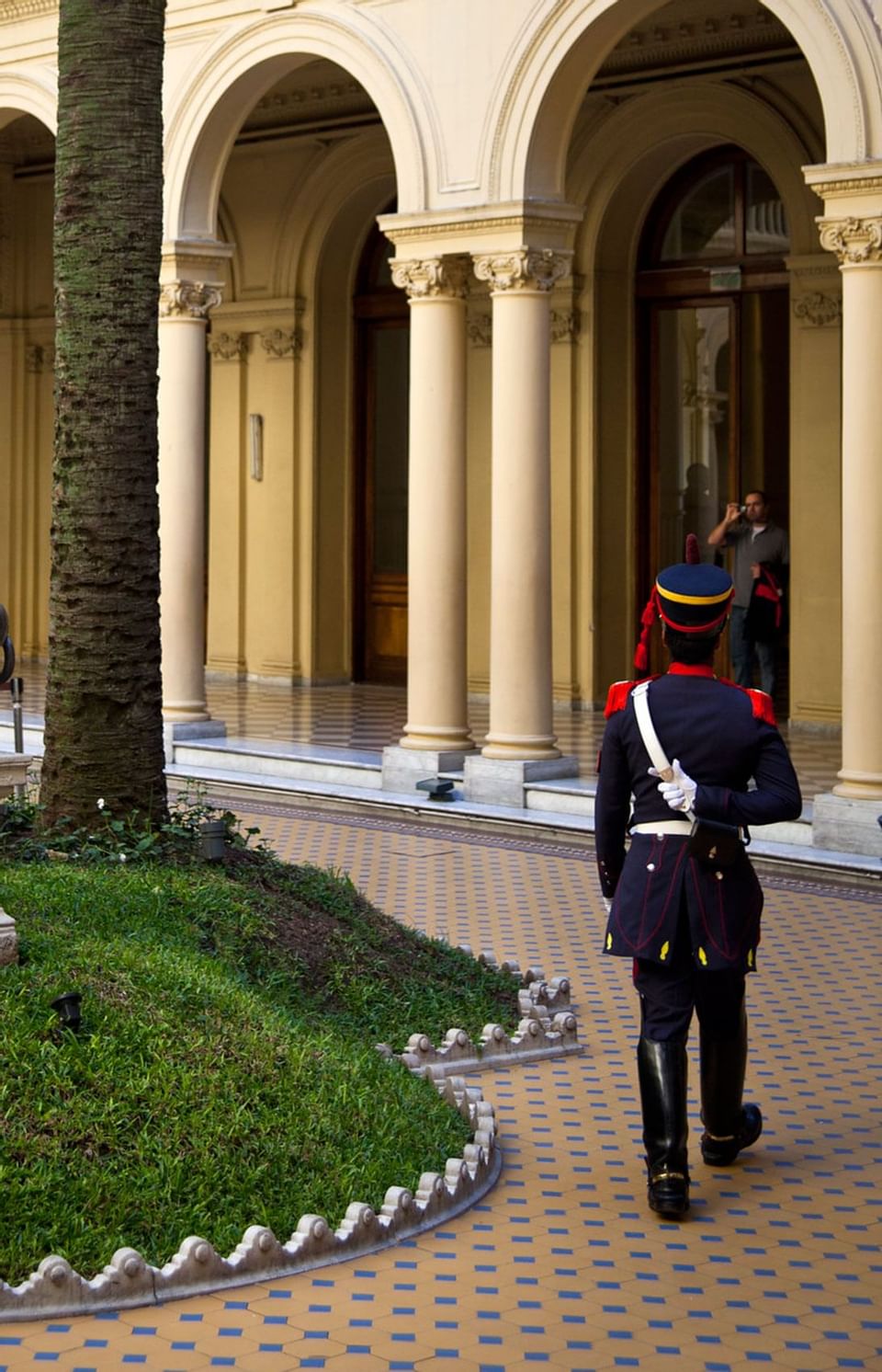 A man in uniform near Hotel Emperador Buenos Aires