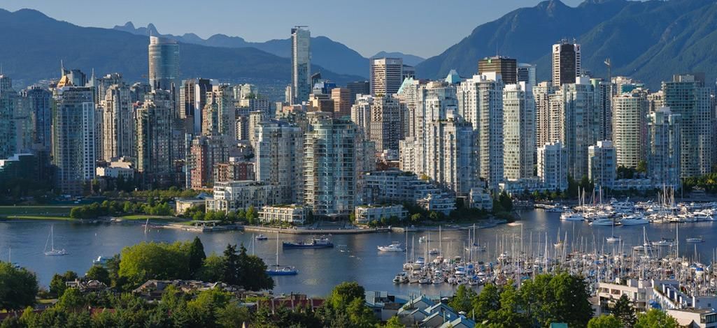 Vancouver city skyline with a view of the ocean and mountains