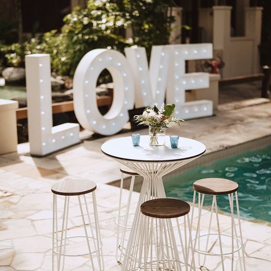 Arranged table by the pool, Pullman Palm Cove Sea Temple Resort