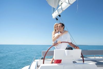 Couple on a yacht near Silkari Reflections Of Port Douglas