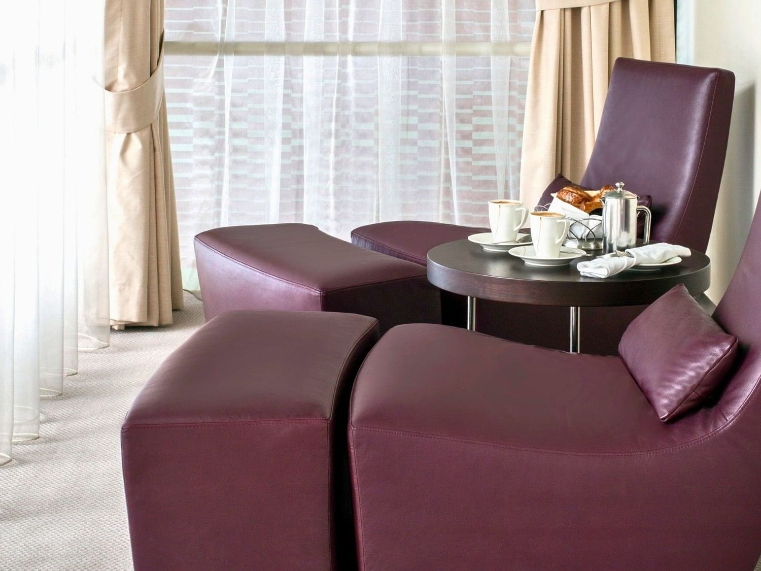 Comfortable sofa in the Living area of Royal Suite at Dubai International Hotel