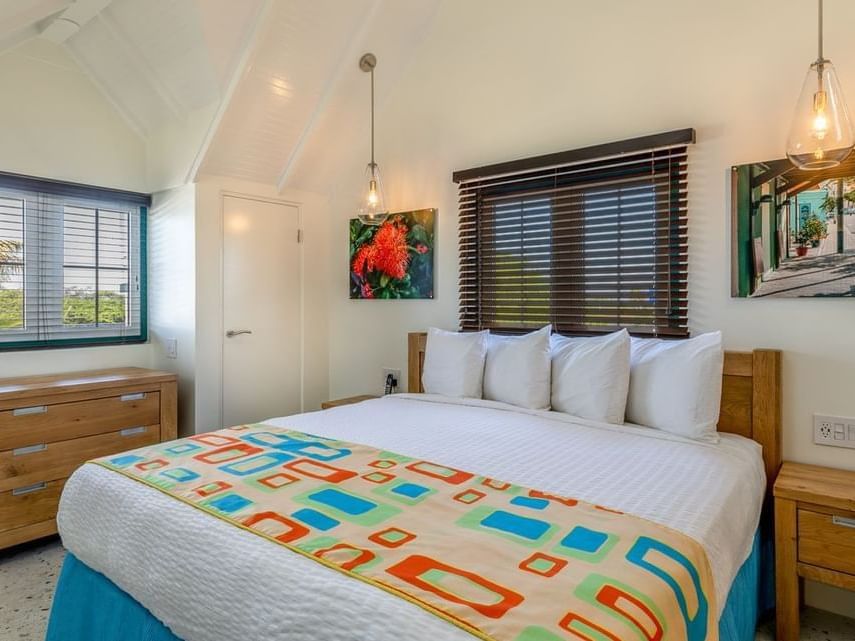 Cozy bedroom with king bed & modern interior in Penthouse at Passions on the Beach