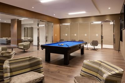 Games room interior with billiards table at ReStays Ottawa