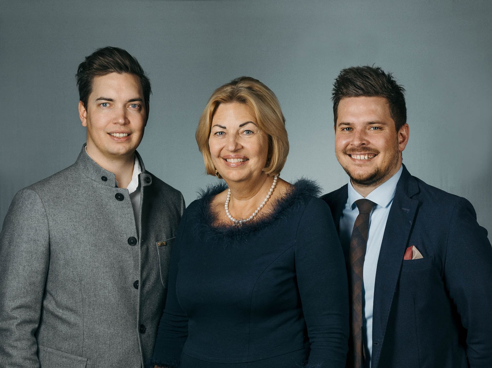 Headshot of 2 gentlemen & a lady from Liebes Rot Flueh's staff