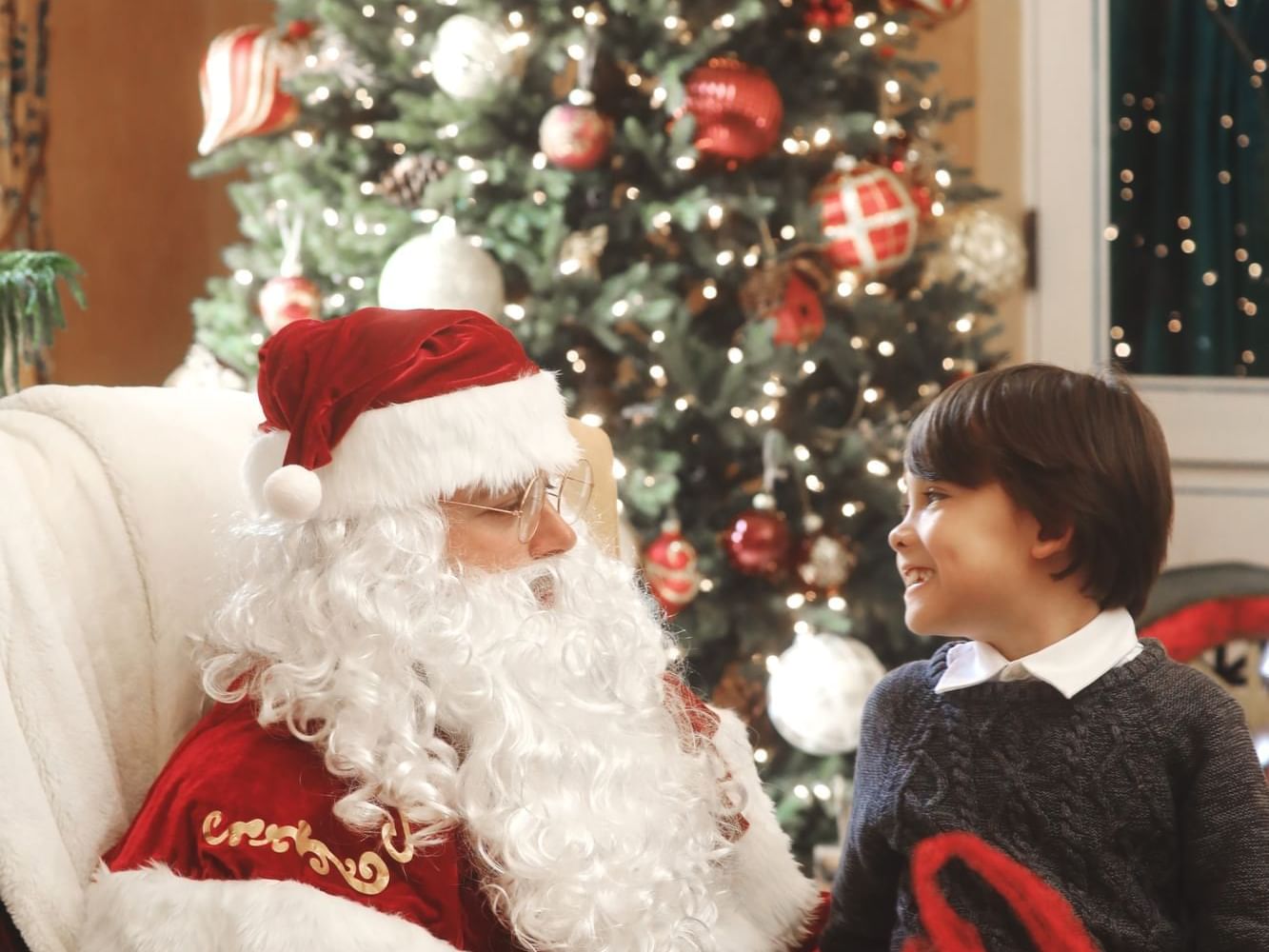 Child sitting on Santa's Lap