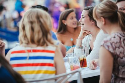 women enjoying live music