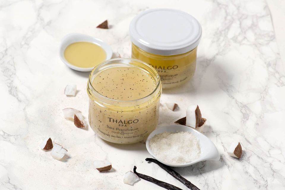 Two jars of Thalgo Spa’s Island Body Scrub with vanilla and coconut on marble at The Saujana Hotel Kuala Lumpur