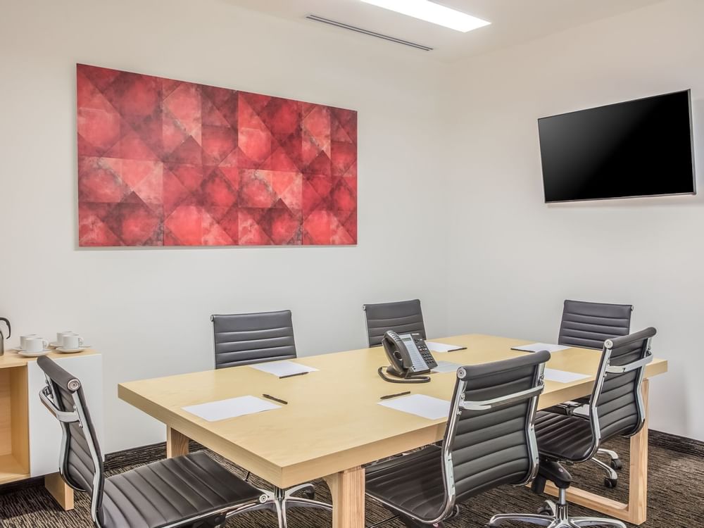 Conference table arranged for a Meeting at Fiesta Inn Hotels 