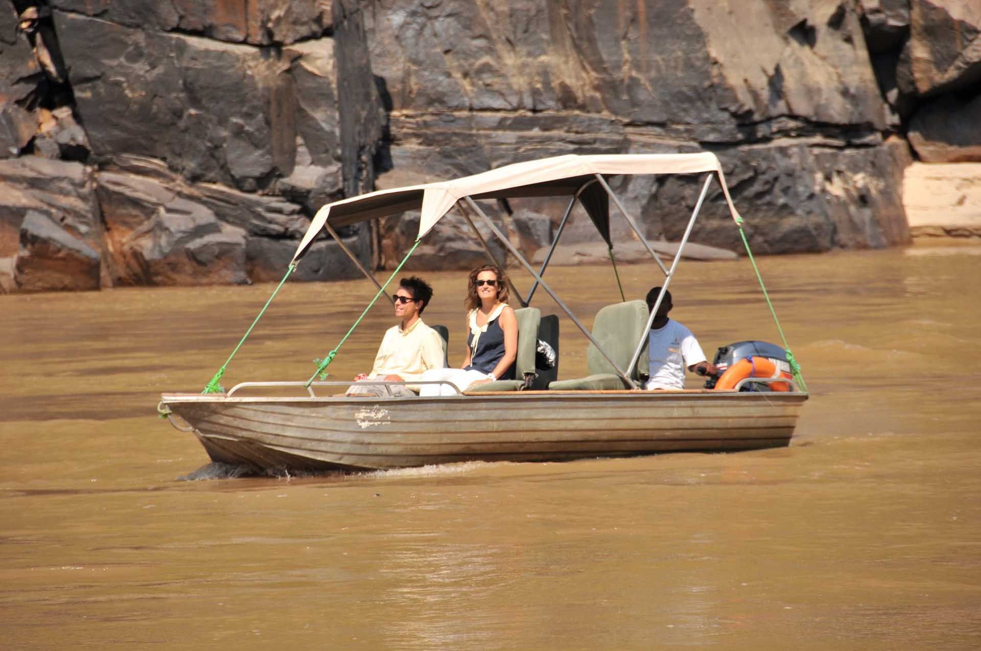Tourists on a boat experience near Serena Mivumo River Lodge