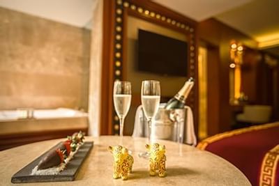 Close up on a bottle of champagne served in room at Hotel Sumaq