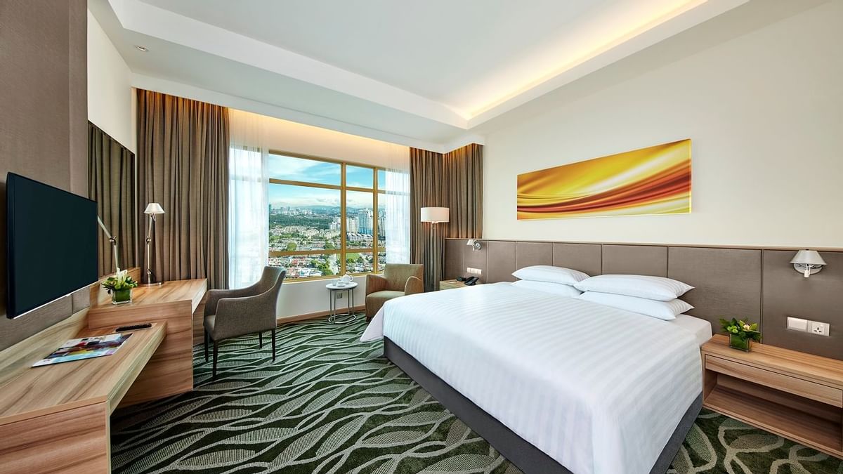 Bed & a TV in Deluxe Plus Executive King Room at Sunway Lagoon