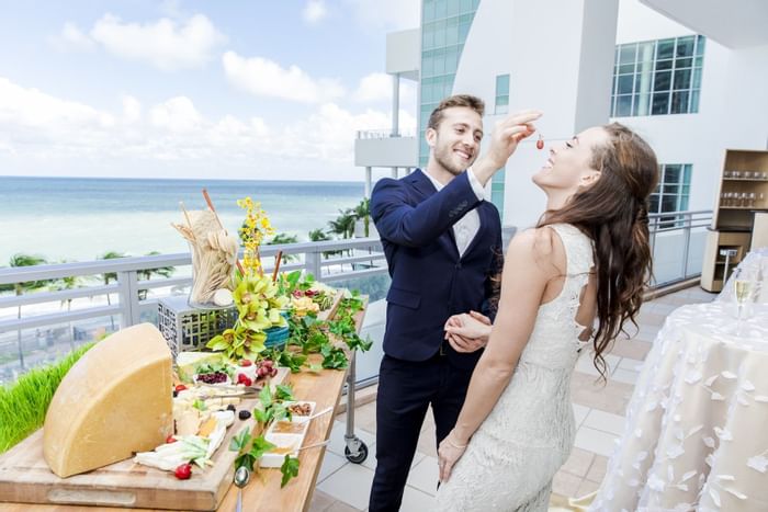 Couple enjoying the meals in Oceanfront at Diplomat Resort