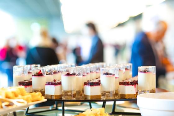 Pudding desserts on the glass tables at Amora Hotel Brisbane