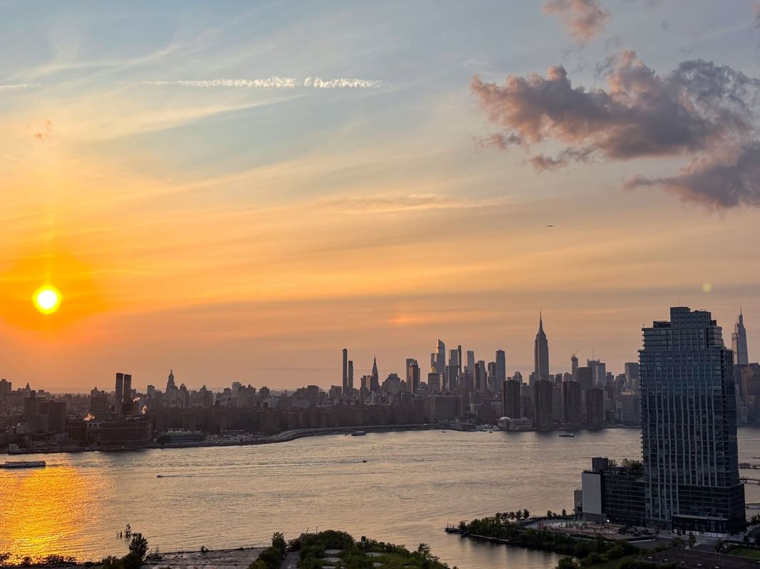 Golden sunset over the New York City skyline and East River view from Warwick New York