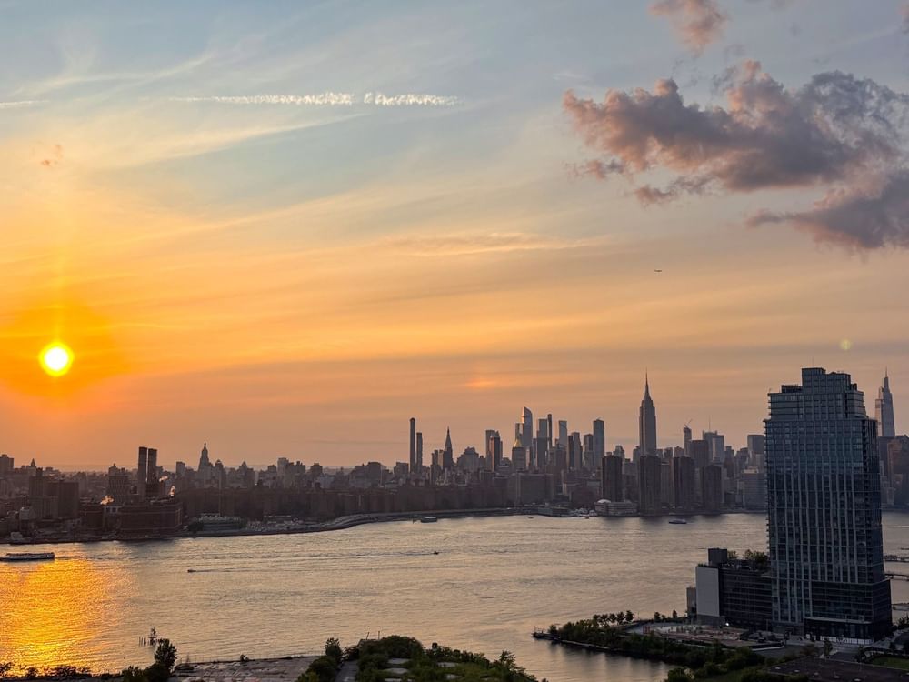 Golden sunset over the New York City skyline and East River view from Warwick New York