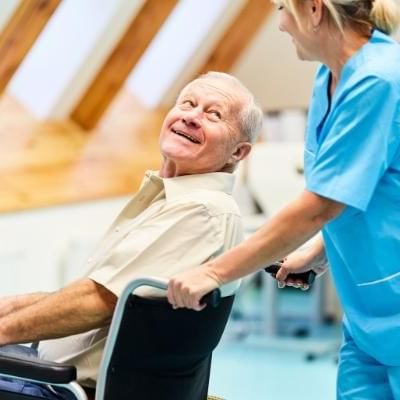 nurse smiling with dementia patient