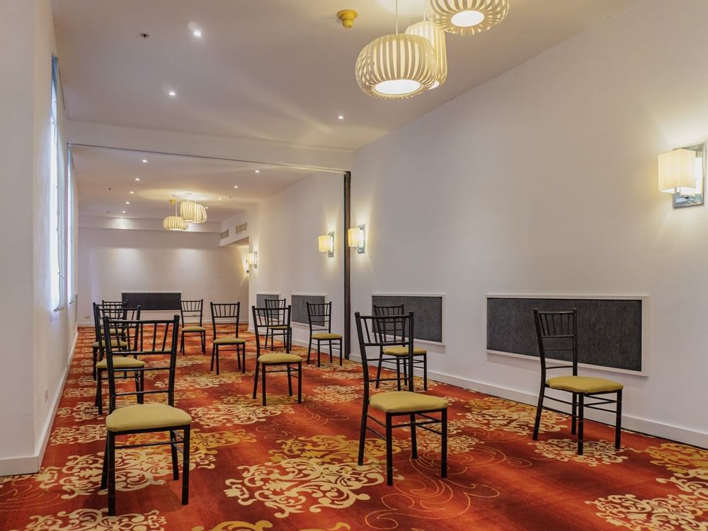 Close-up of chair arrangements in Rubi A Room at Gamma Hotels