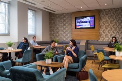 People in Freddies Lounge at The Goodenough Hotel
