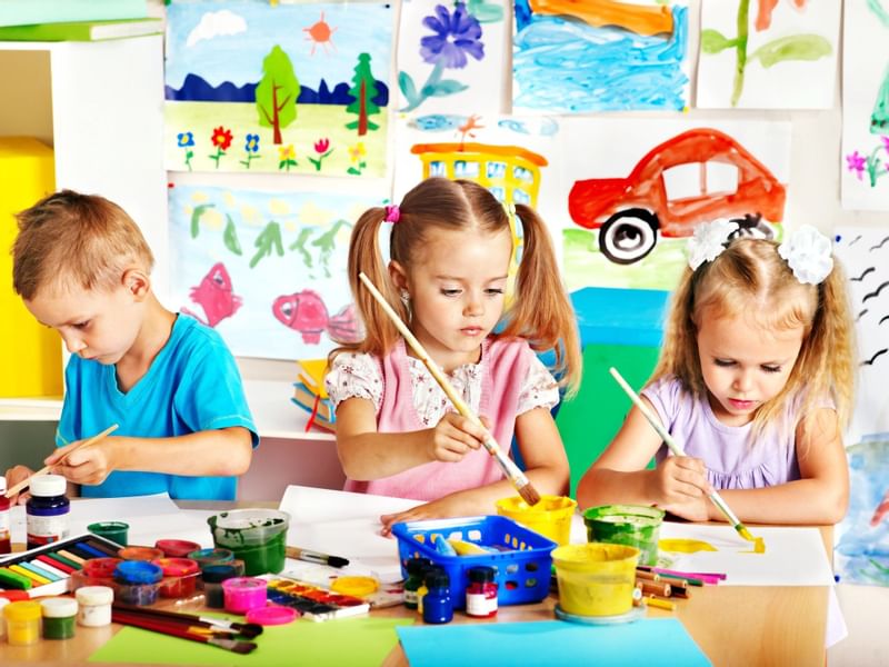 Kids painting in the Kids' Club at The Diplomat Resort