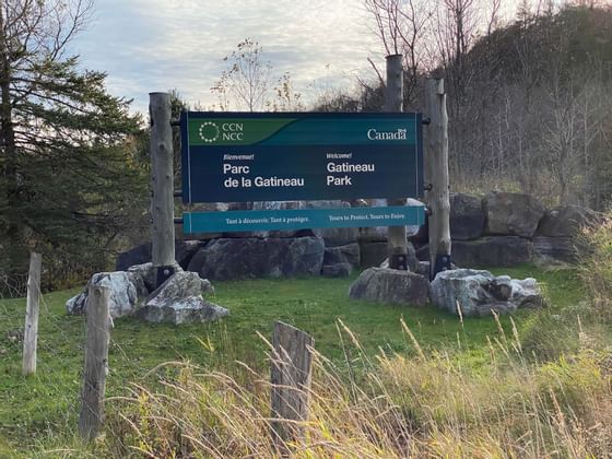 A Gatuineau park sign board near ReStays Ottawa