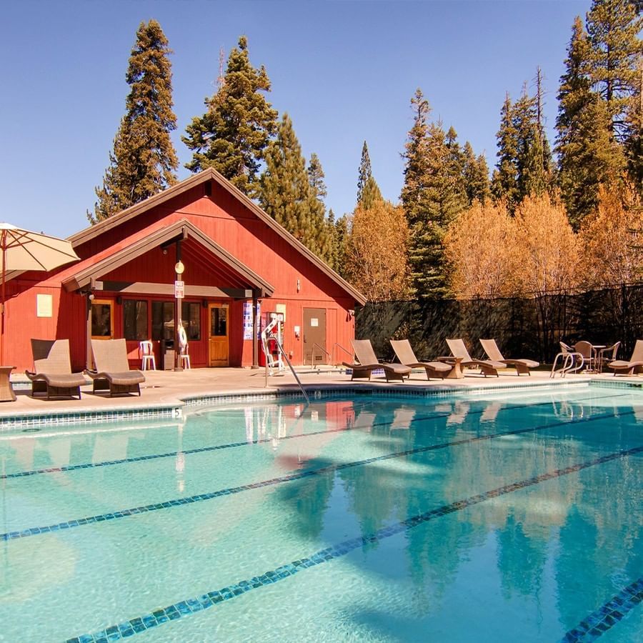 Outdoor pool with loungers in autumn at Granlibakken Tahoe