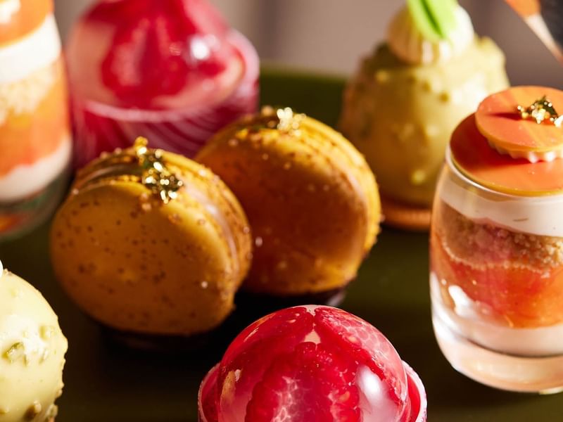 Assorted desserts with vibrant colors served in TWR Bar at Crown Hotel Melbourne